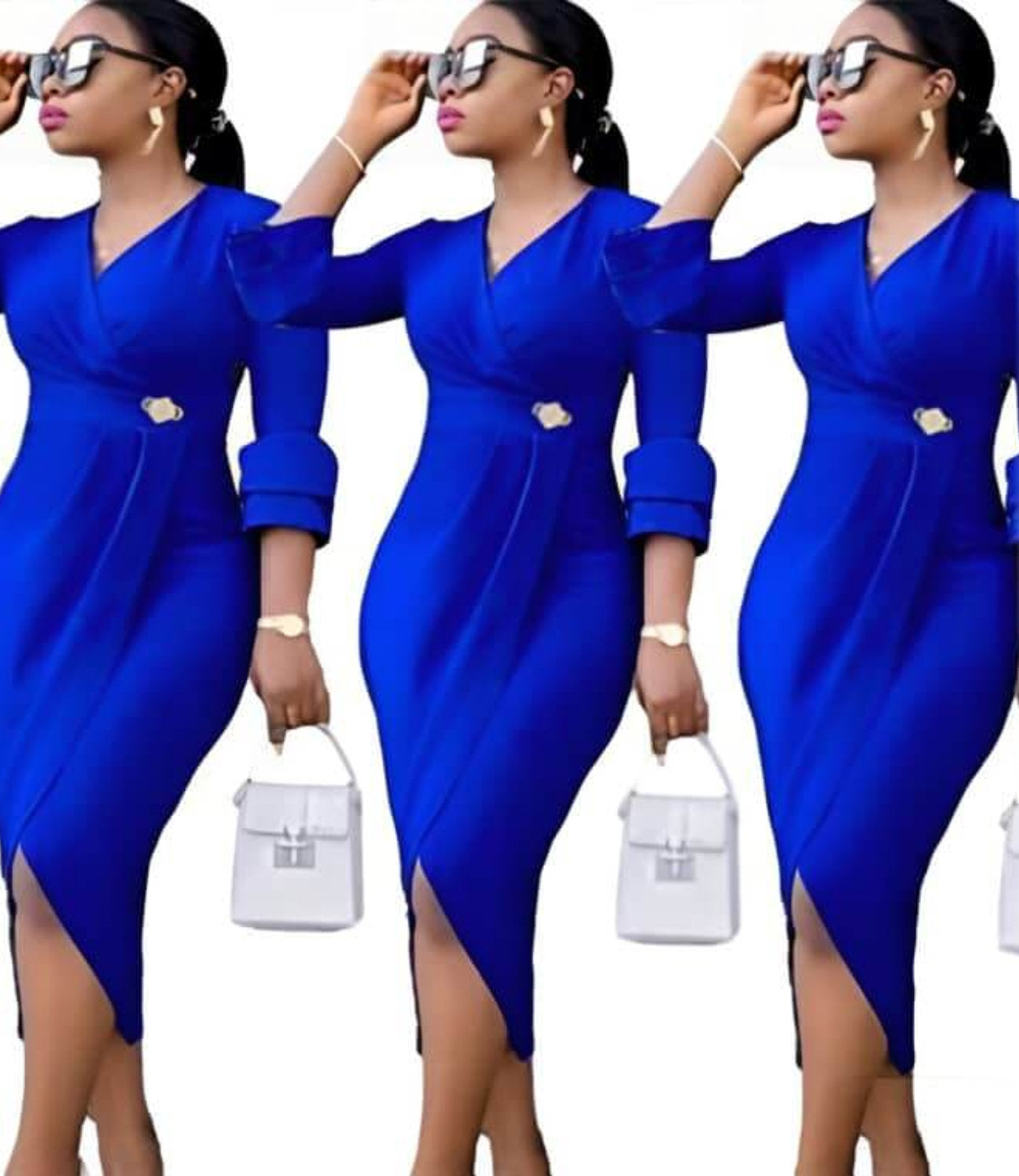 Woman in a vibrant blue dress with rolled sleeves, holding a white handbag, face blurred for privacy.